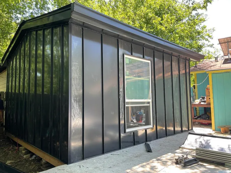 Black standing seam metal wall panels for Roof Inspection in Chino Valley