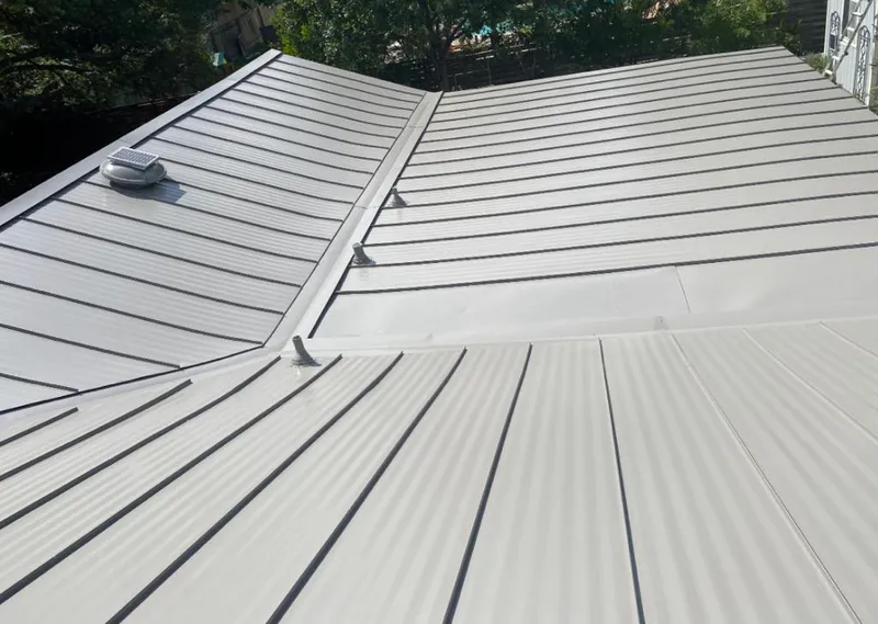 Solar attic fan installed on a metal roof for Roof Ventilation in Chino Valley